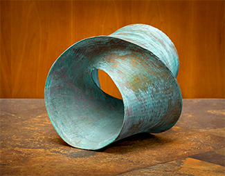 Oculum, a 3 dimensional 1 sided patinated contemporary sculpture - Kevin Caron