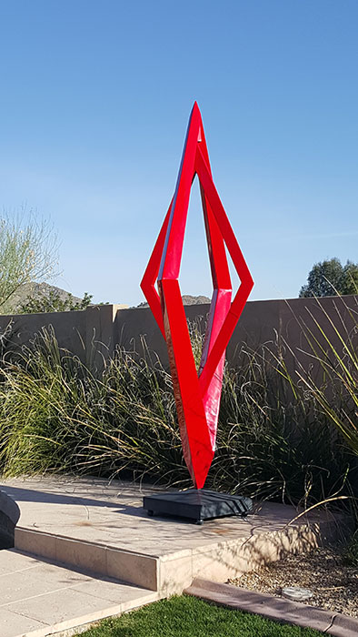 Fuego, a contemporary red kinetic sculpture, rotated - Kevin Caron