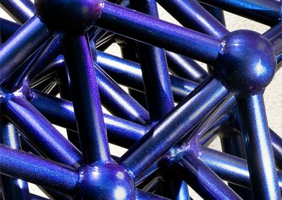 A close up of Supercharged Particle, a kinetic, color changing contemporary sculpture - Kevin Caron