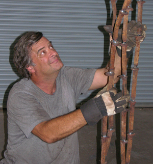 Sculptor Kevin Caron working on a new free-standing sculpture