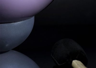 A closeup of Harmony, a lilac colored sound bowl - Kevin Caron