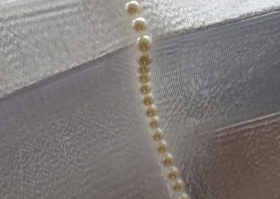 Close up of sculpture Debutante's string of pearls - Kevin Caron