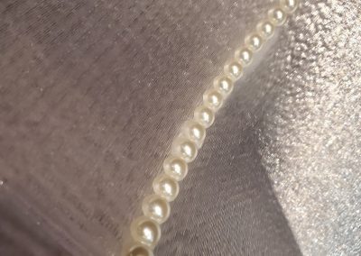 Closeup of sculpture Debutante's string of pearls - Kevin Caron
