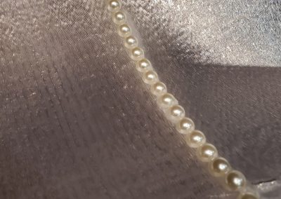 Closeup of sculpture Debutante's string of pearls - Kevin Caron