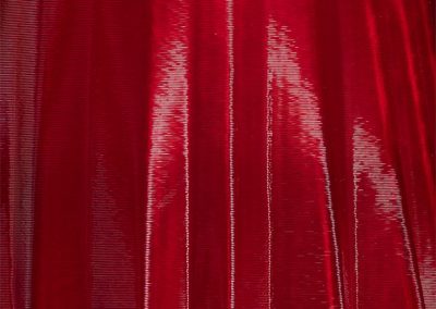 Detail of Lift-off, a translucent red contemporary sculpture Kevin Caron